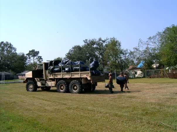 cleaning up a school after the natural disaster that was hurricane katrina.